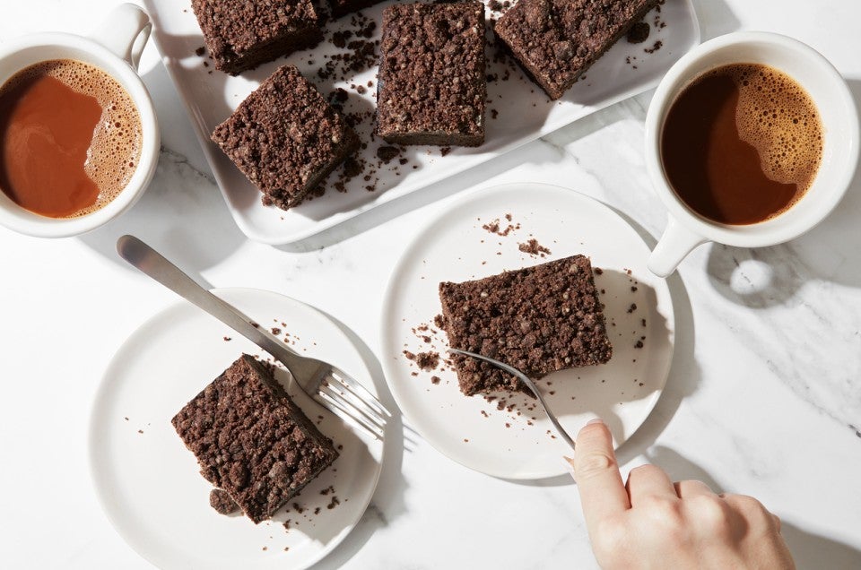 A breakfast scene with coffee and slices of rye chocolate coffeecake - select to zoom